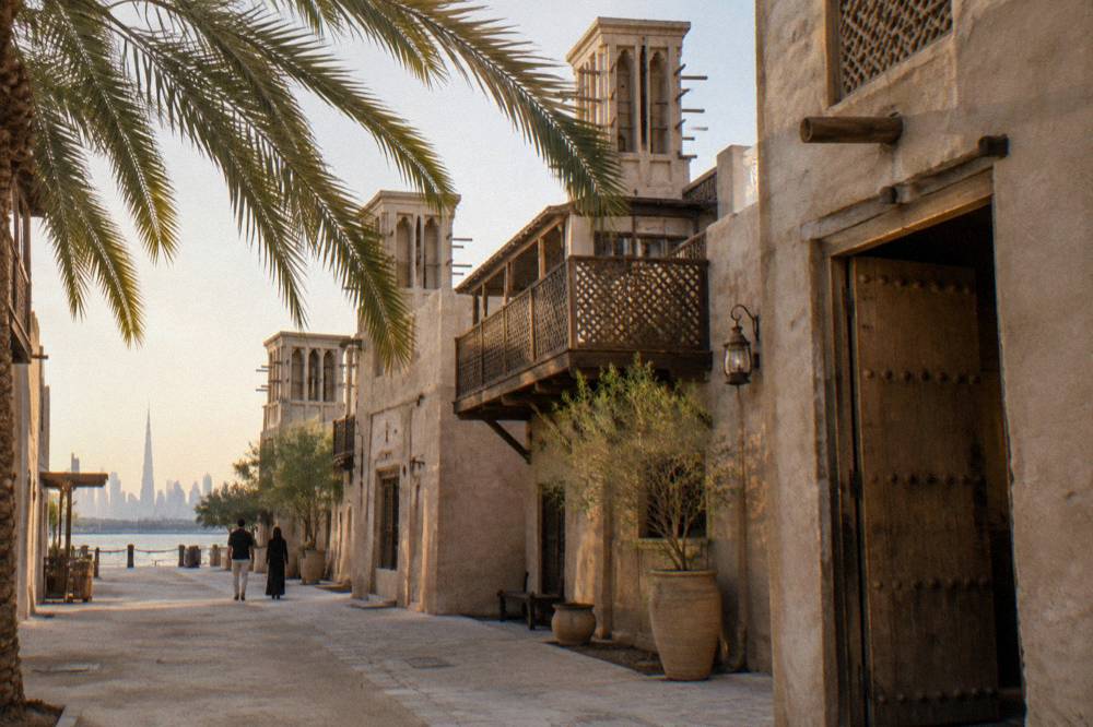 Heritage style wind tower buildings in an old Dubai district in daylight