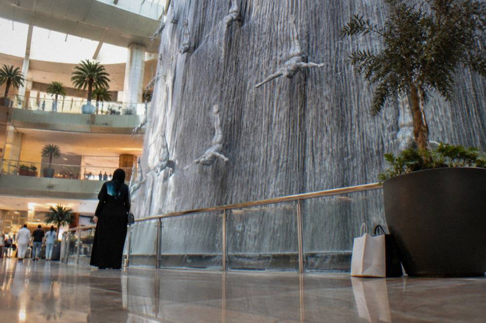 Man-made waterfall feature inside a shopping mall