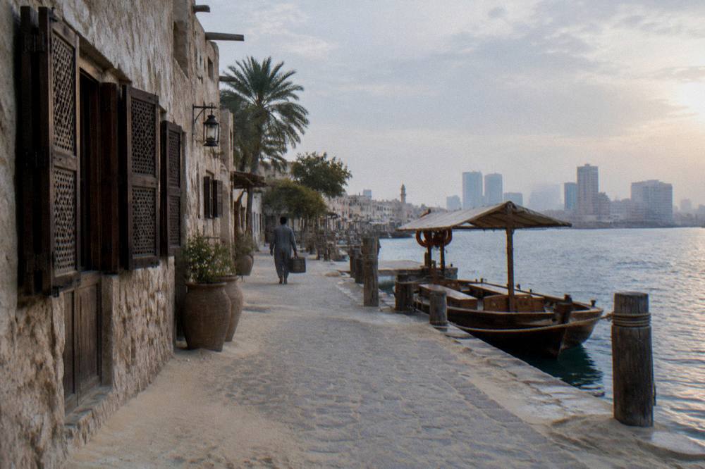 Old quarter street with low buildings beside a waterway
